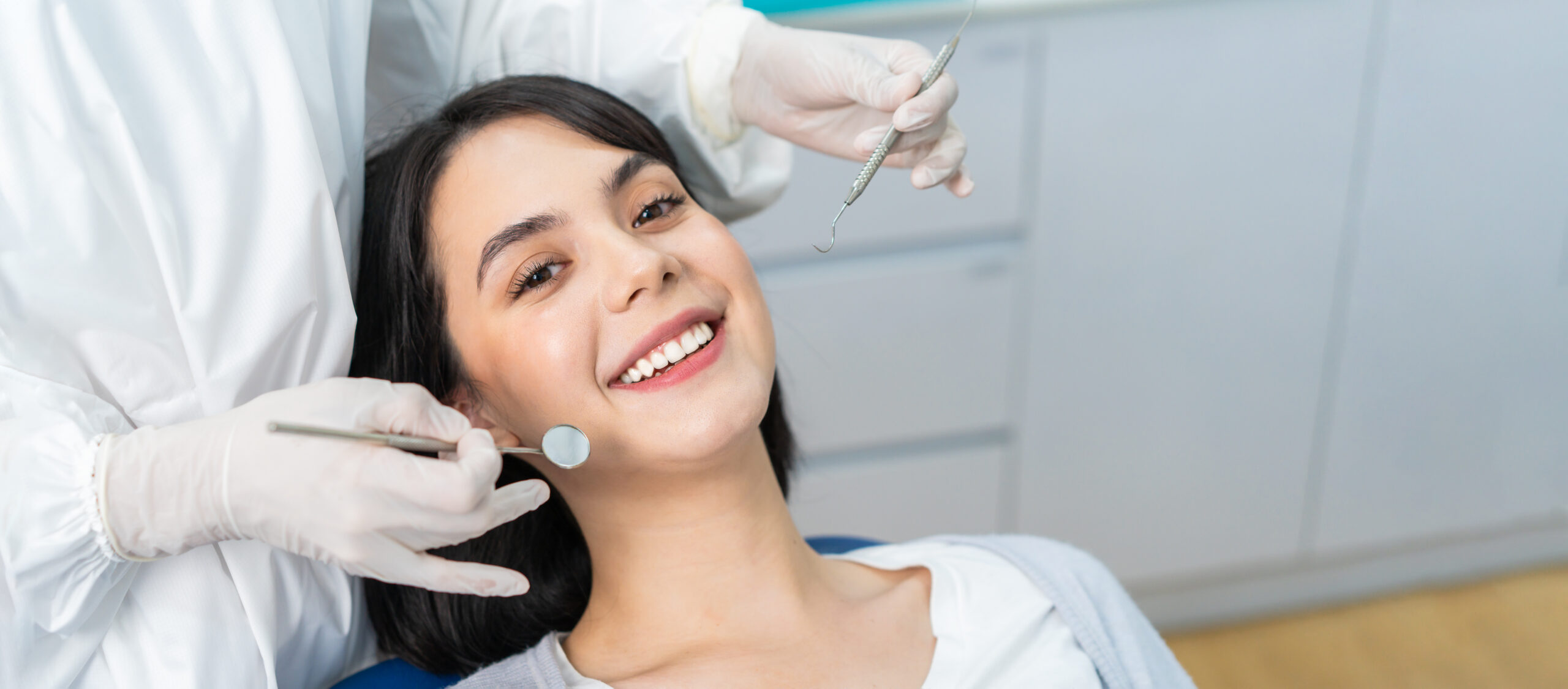 Portrait of Caucasian girl patient smiling ready for oral care checkup