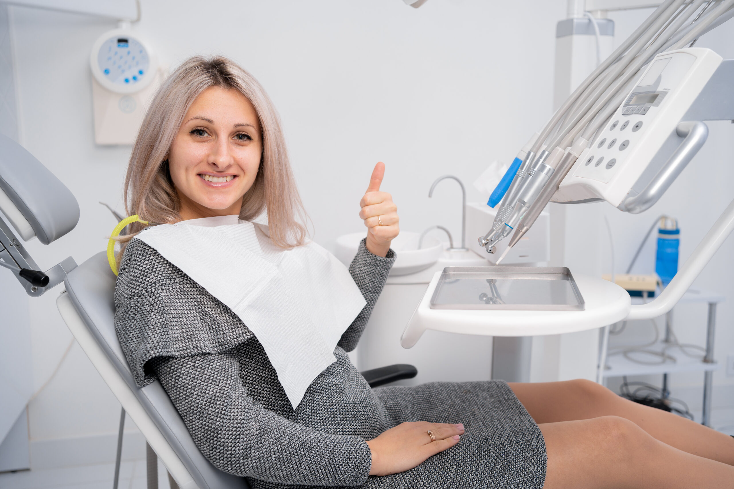 Patient smiling after computer-guided dental implant surgery at Gardens Dentistry Palm Beach Gardens Florida